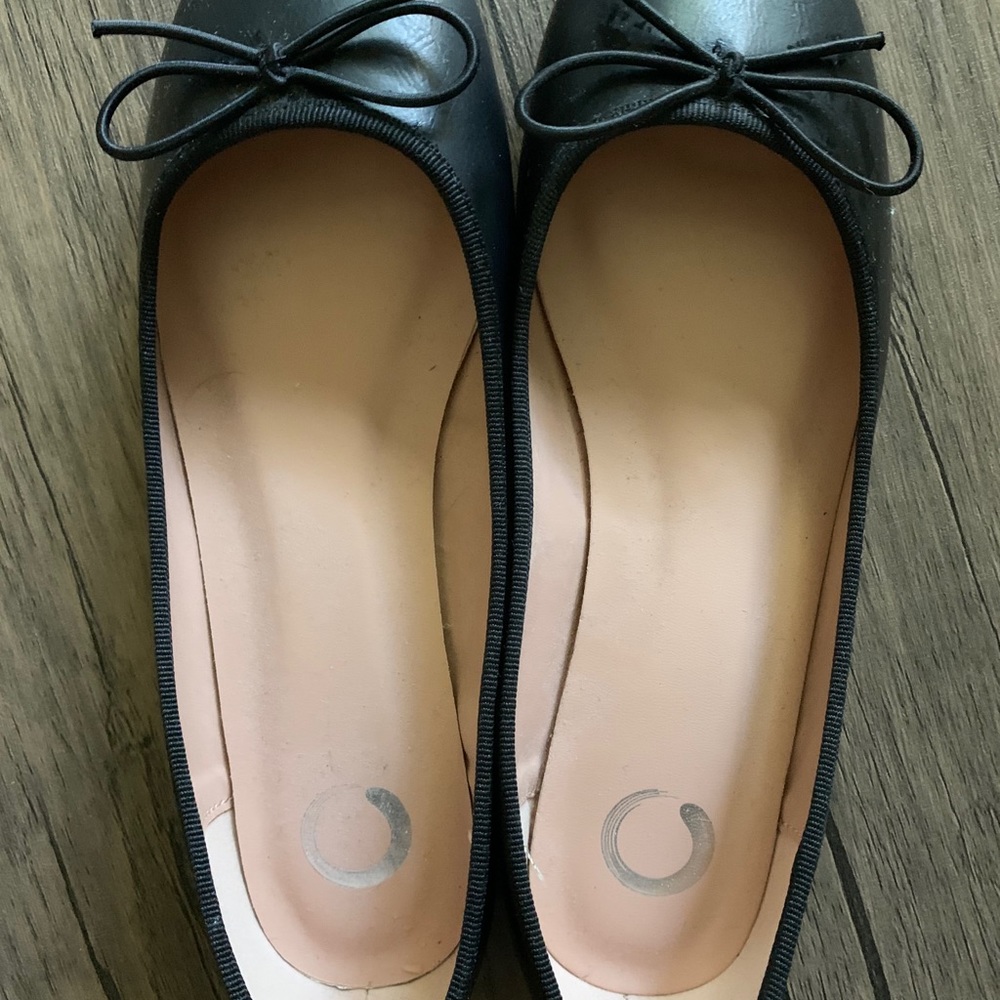 Black leather flats
